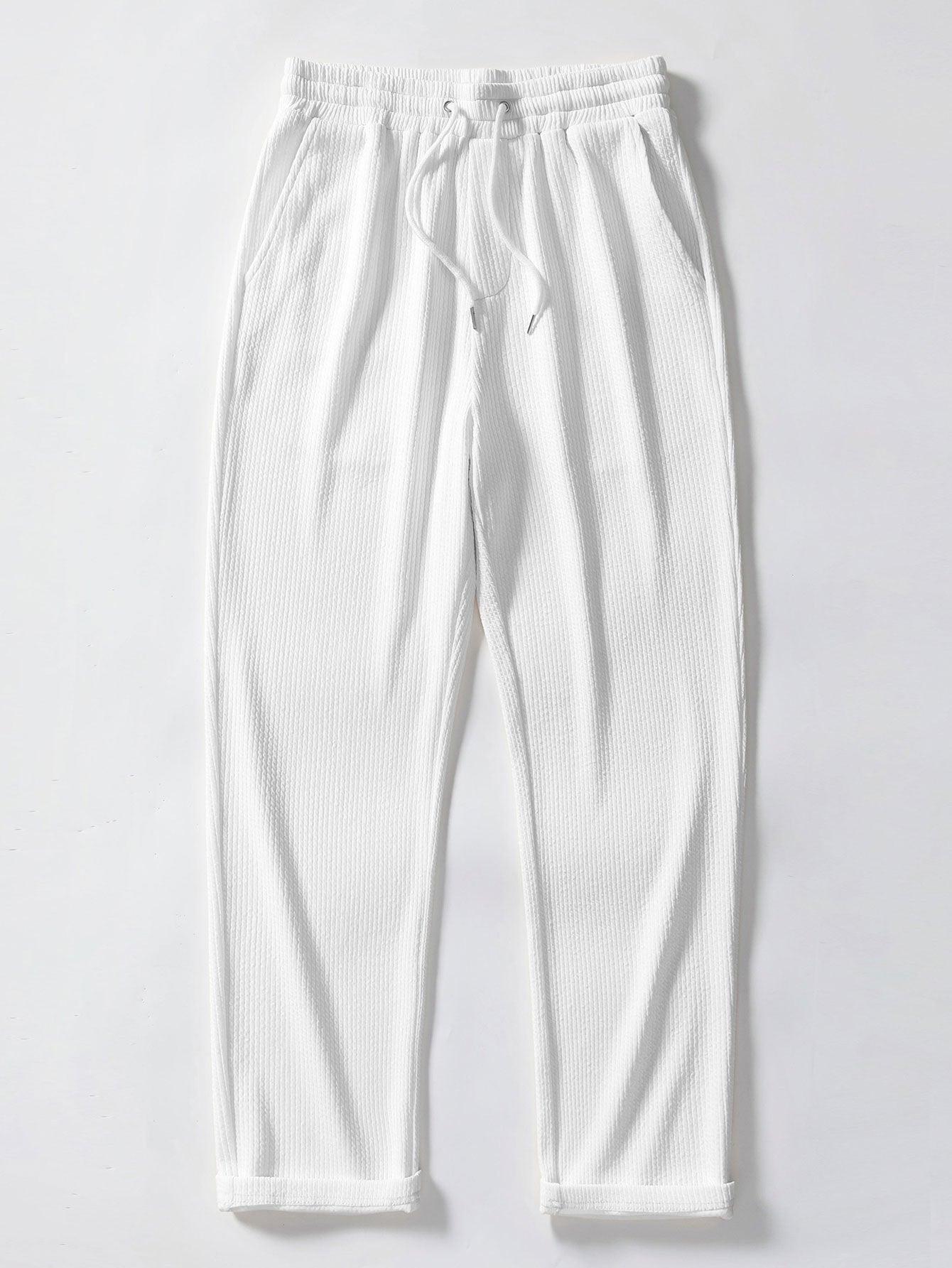 Pantalón recto acanalado blanco con cinturilla elástica y cordón