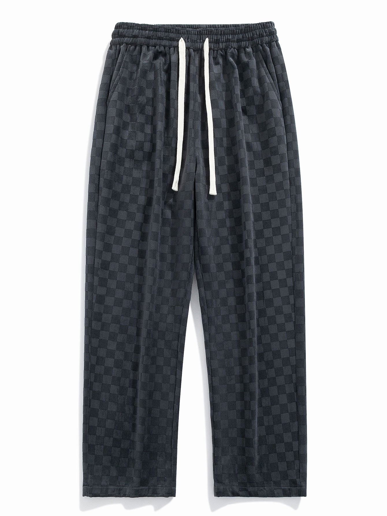 Pantalón recto oscuro con patrón damero, cintura elástica y cordón blanco.