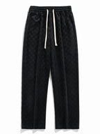 Pantalón recto texturizado negro con cordón en cintura elástica y bolsillos