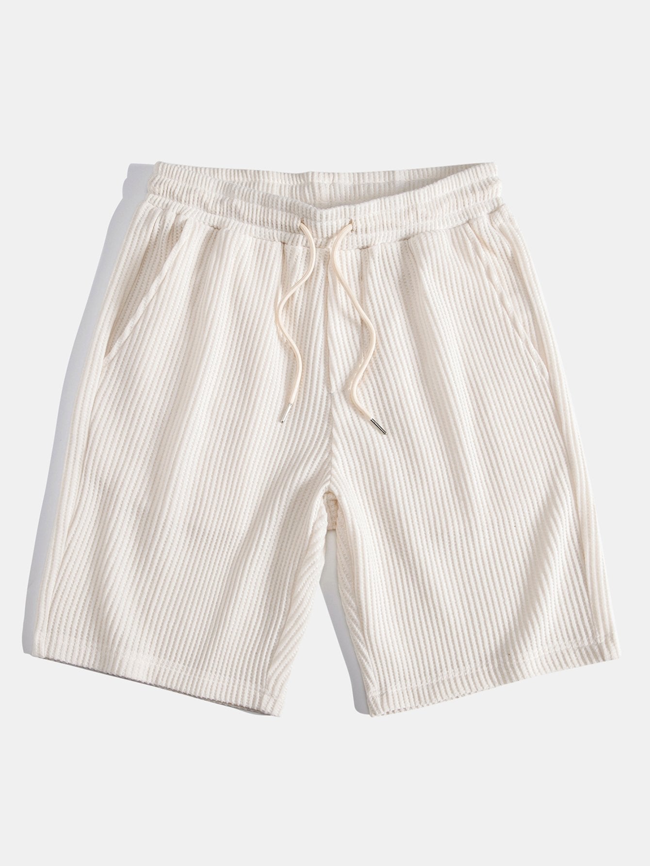 Pantalones cortos de punto beige con cordón y cintura elástica