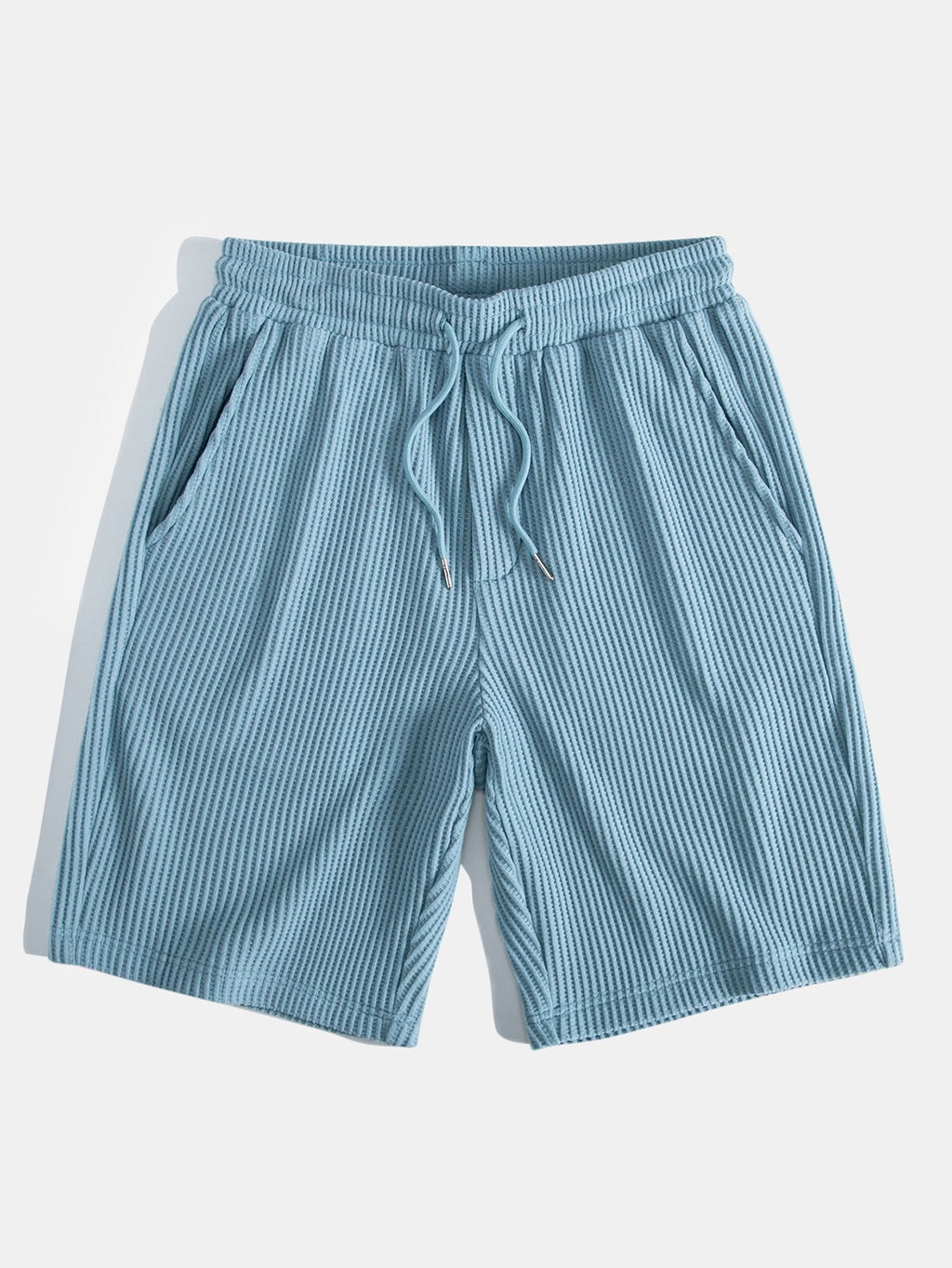 Pantalones cortos de punto celestes con cordón y cintura elástica