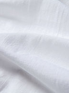 Tela blanca tipo lino de algodón, con textura sutil
