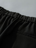 Pantalón recto relax negro: cintura elástica con frunce