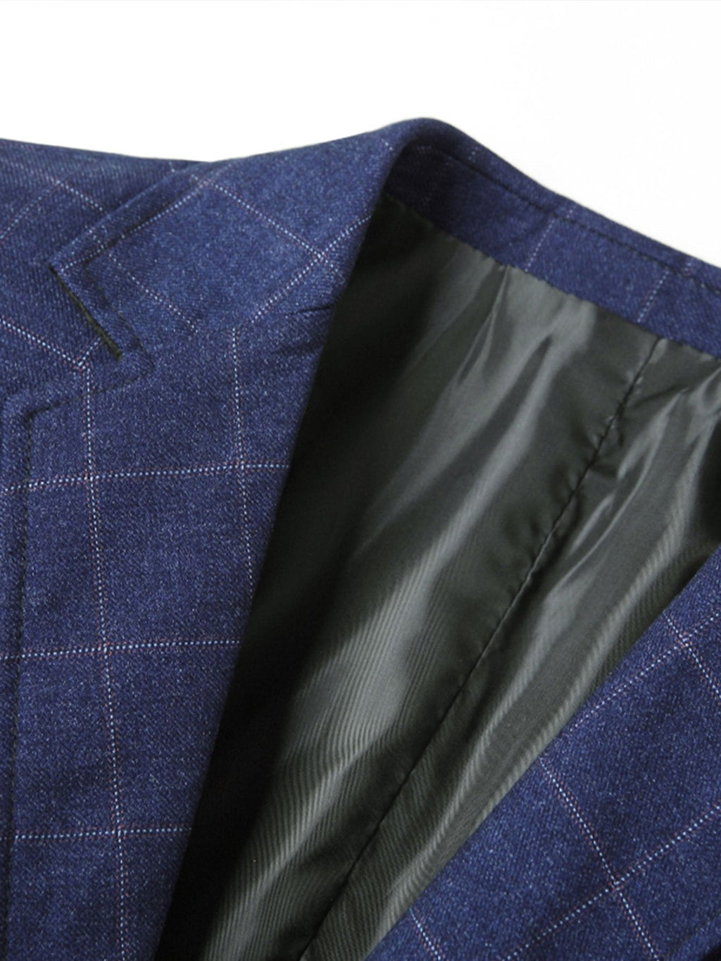 Blazer azul marino de cuadros: tejido y forro interior con costura a lo largo del borde