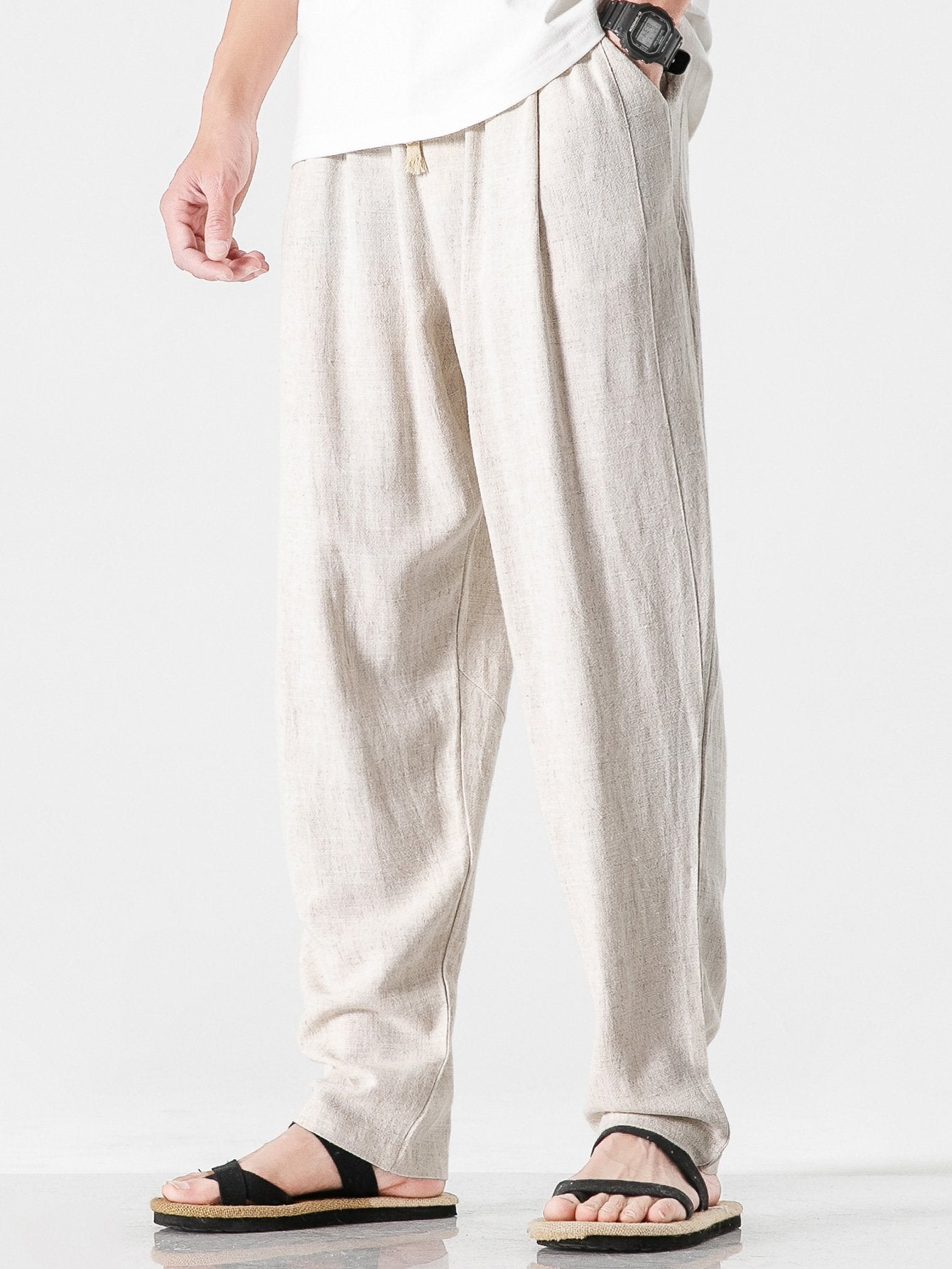 Pantalón harem de lino y algodón color crema, tiro elástico y piernas sueltas