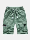 Pantalón corto Aspen verde con cordón blanco y bolsillos cargo laterales