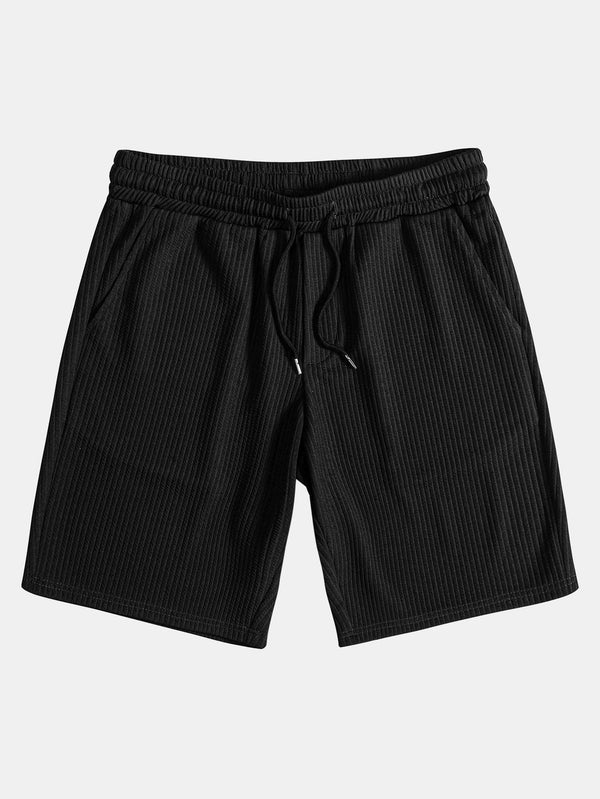 Pantalón corto negro con cintura elástica y cordón ajustable