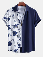 Camisa azul marino de mangas cortas con botones y estampado floral blanco y azul