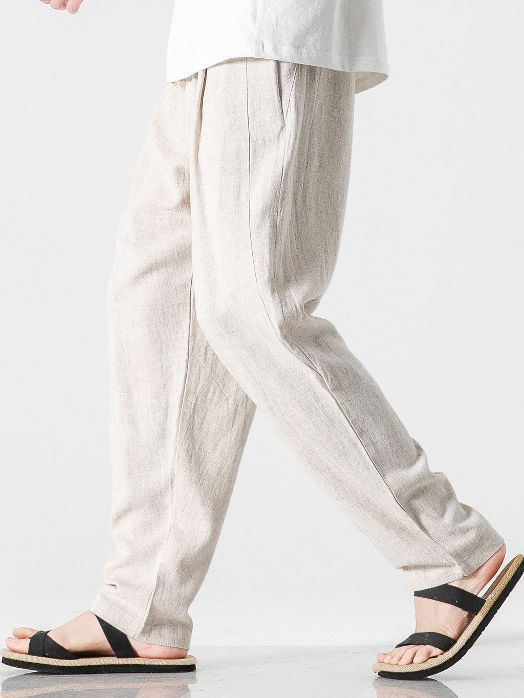Pantalón harem de lino y algodón beige, tiro elástico y caída holgada