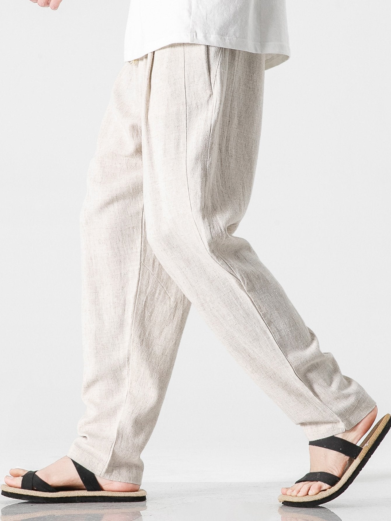 Pantalón harem de lino y algodón beige, tiro elástico y caída holgada