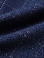 Tejido del blazer azul marino con cuadros texturizados y trama con brillo sutil