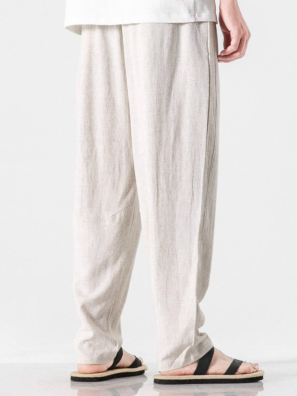 Pantalón harem de lino y algodón beige claro, pinzas frontales y pierna amplia