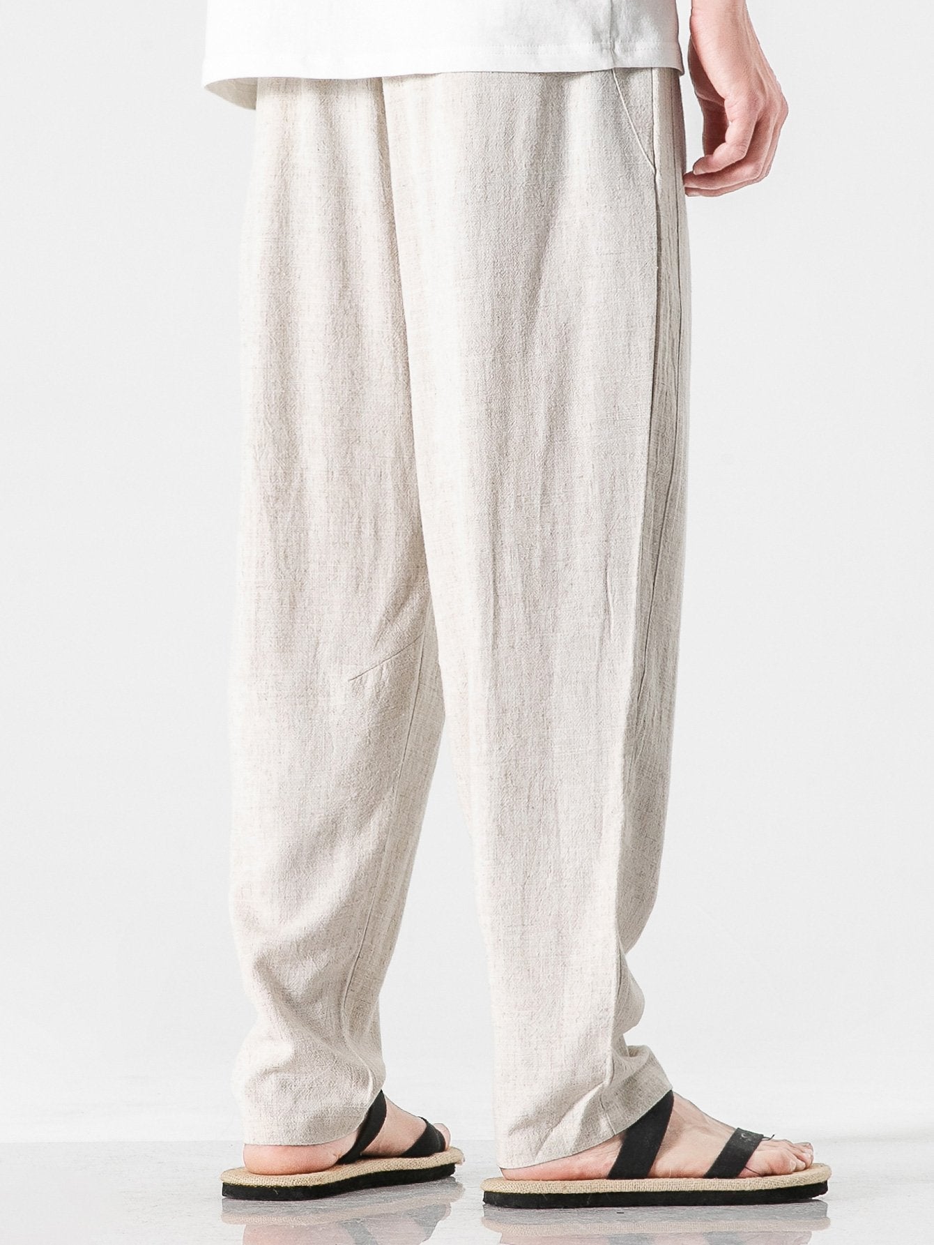 Pantalón harem de lino y algodón beige claro, pinzas frontales y pierna amplia