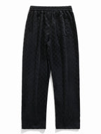 Pantalón recto texturizado negro con cintura elástica y bolsillos laterales