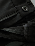 Pantalón recto relax negro: cierre con cremallera y botón