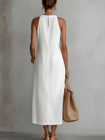 Vestido blanco sin mangas con espalda lisa y abertura inferior