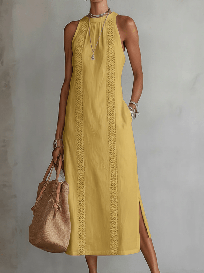 Vestido amarillo sin mangas con franja de encaje vertical y abertura lateral