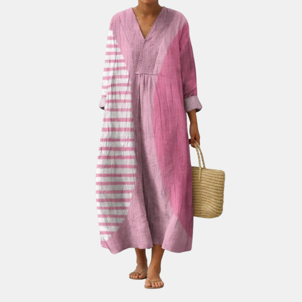 Vestido de lino rosa con escote en V, panel a rayas en el lado izquierdo y falda midi