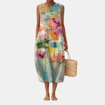 Vestido midi sin mangas estampado multicolor, dobladillo a media pierna y vuelo