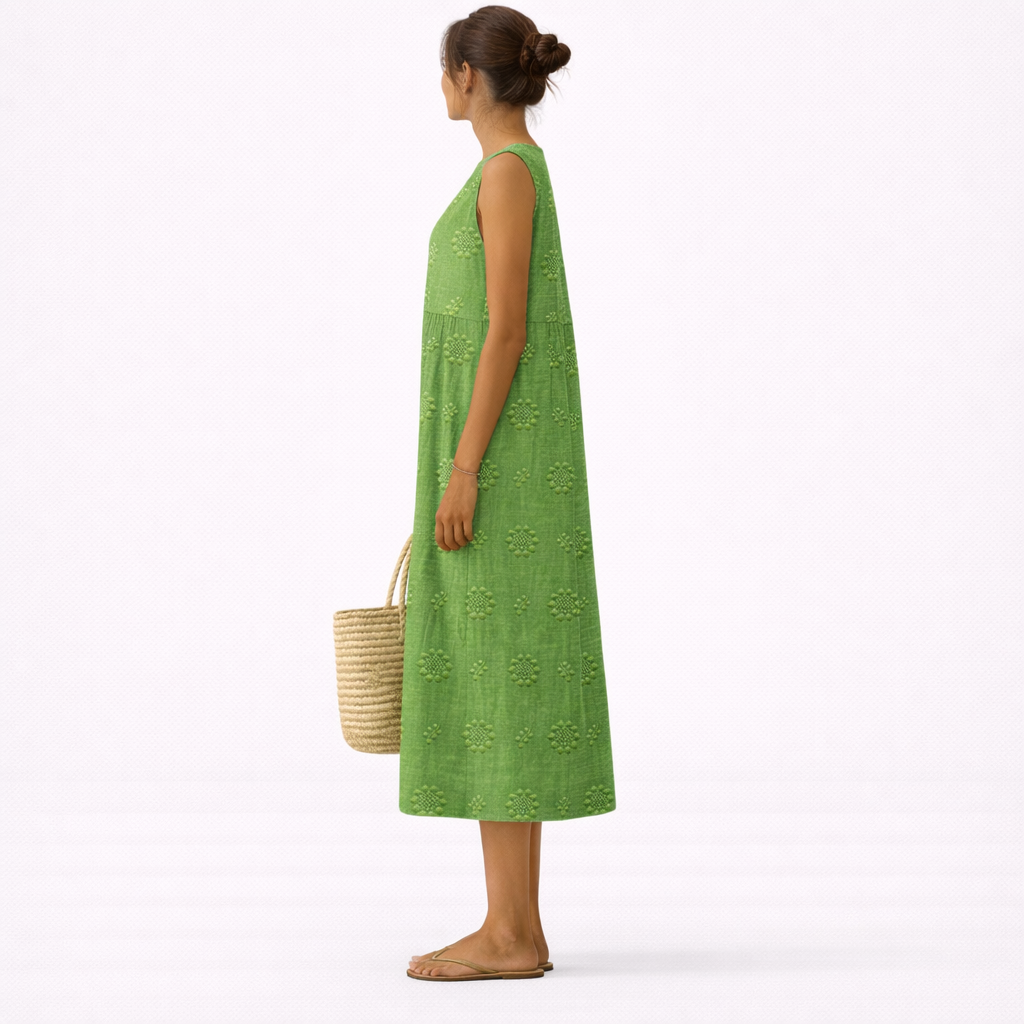 Vestido midi verde sin mangas con estampado floral; vista trasera de perfil
